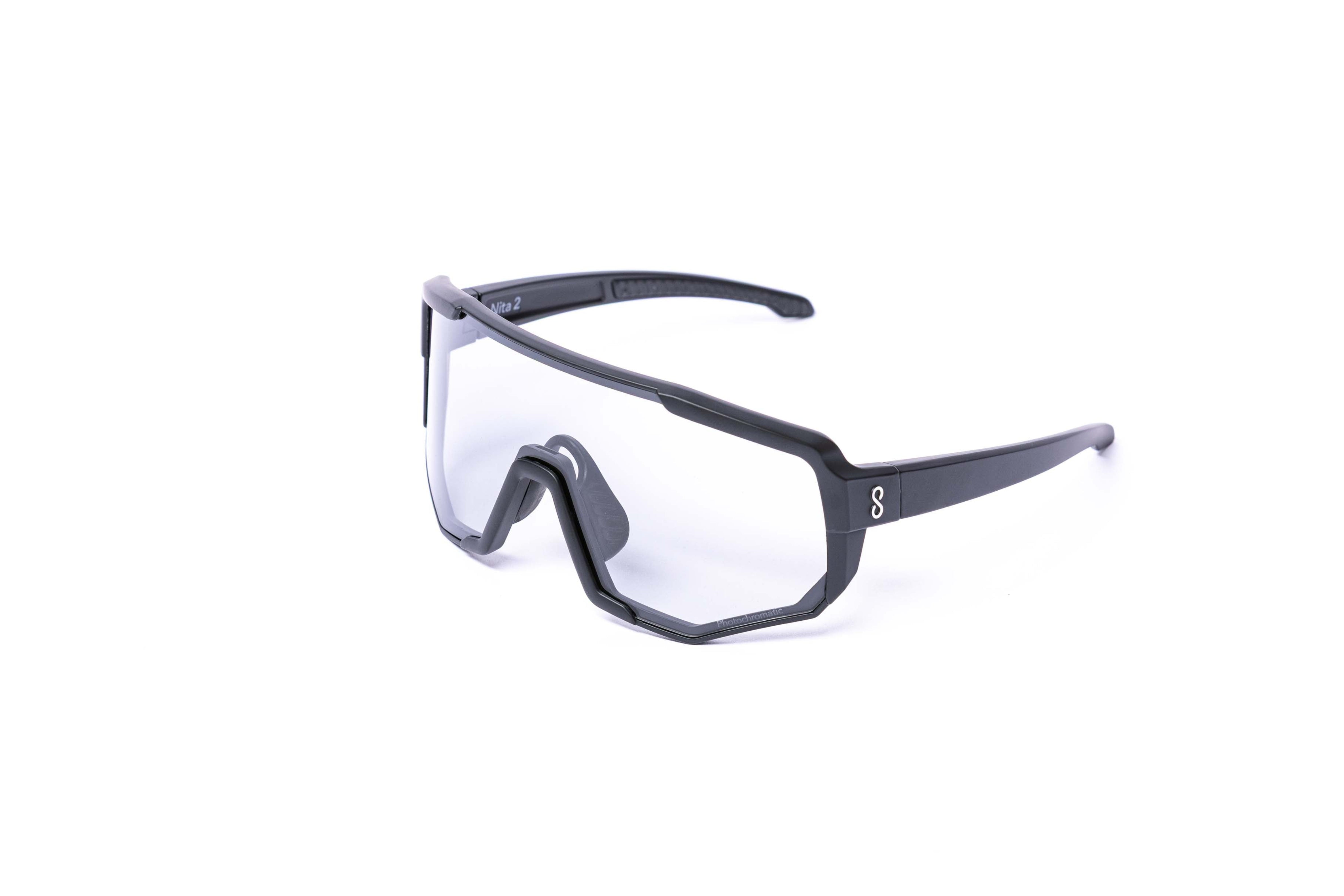 Coast Optics Mountain Bike Glasses Sunglasses with a black frame and photochromatic lenses on a white background