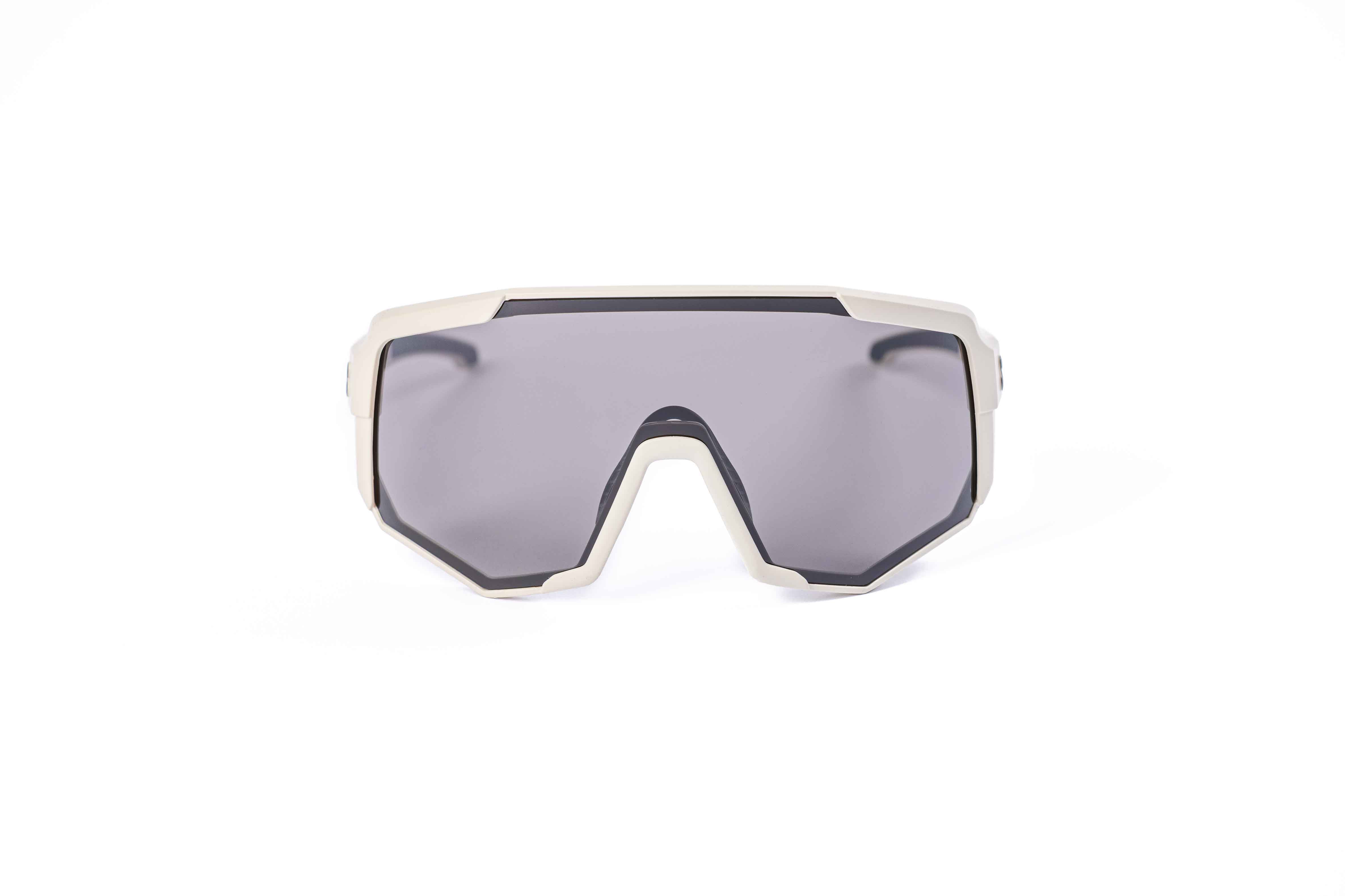 Coast Optics Nita XL MTB riding glasses in beige off-white frame with interchangeable lens, designed for trail and enduro riders.