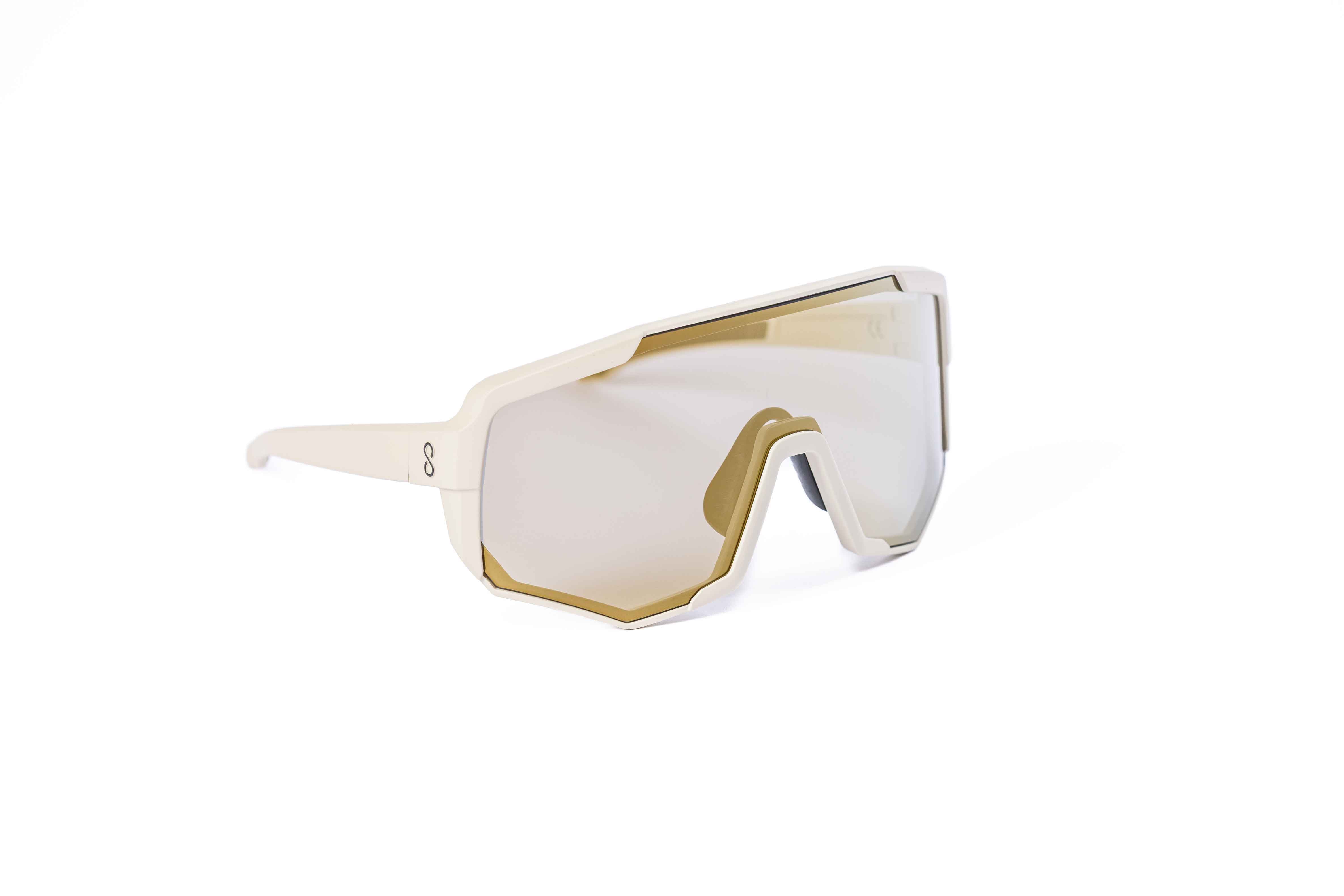 Coast Optics Nita XL MTB riding glasses in beige off-white frame with interchangeable lens, designed for trail and enduro riders.