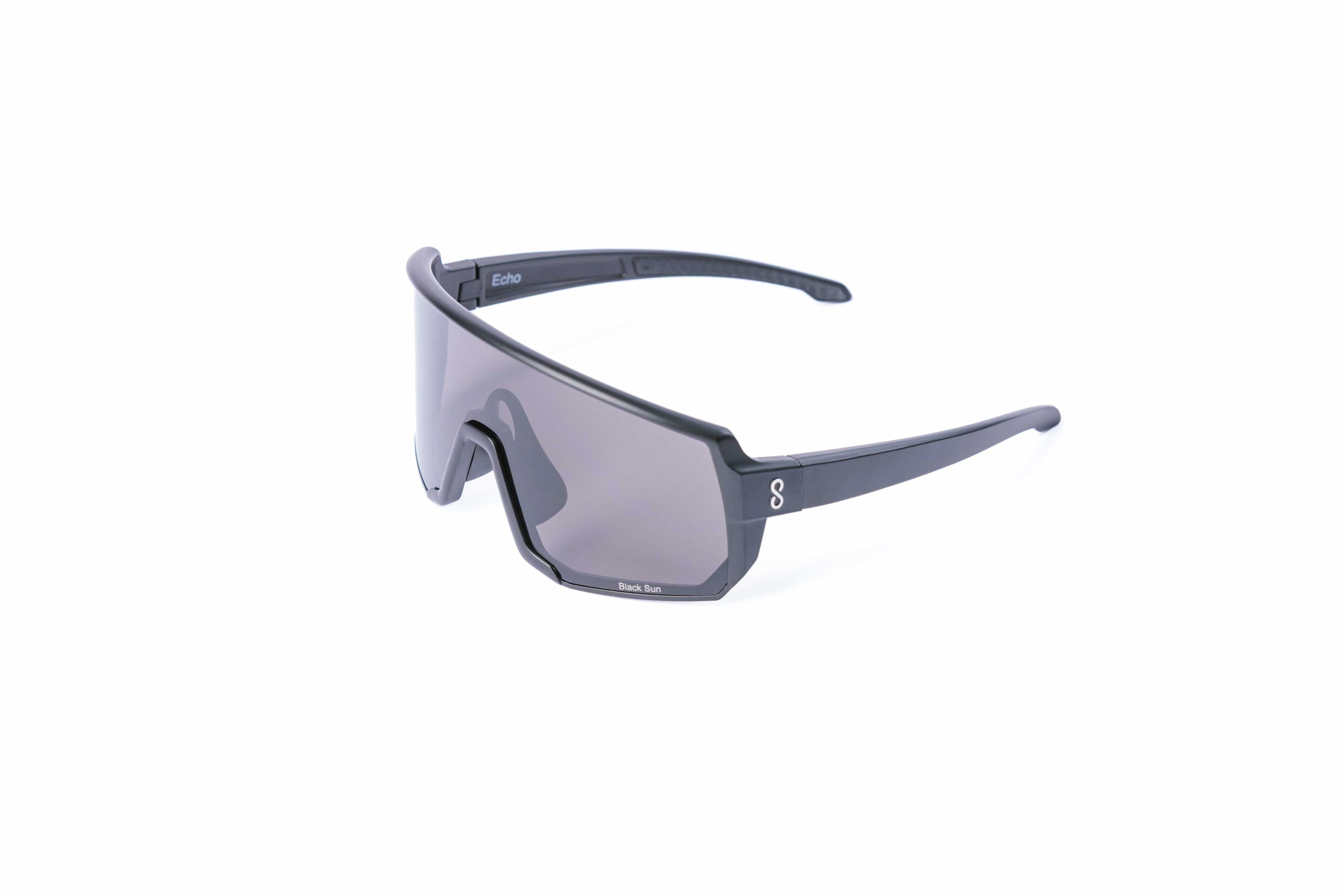 Small size black sunglasses with an interchangeable black lens on a white background