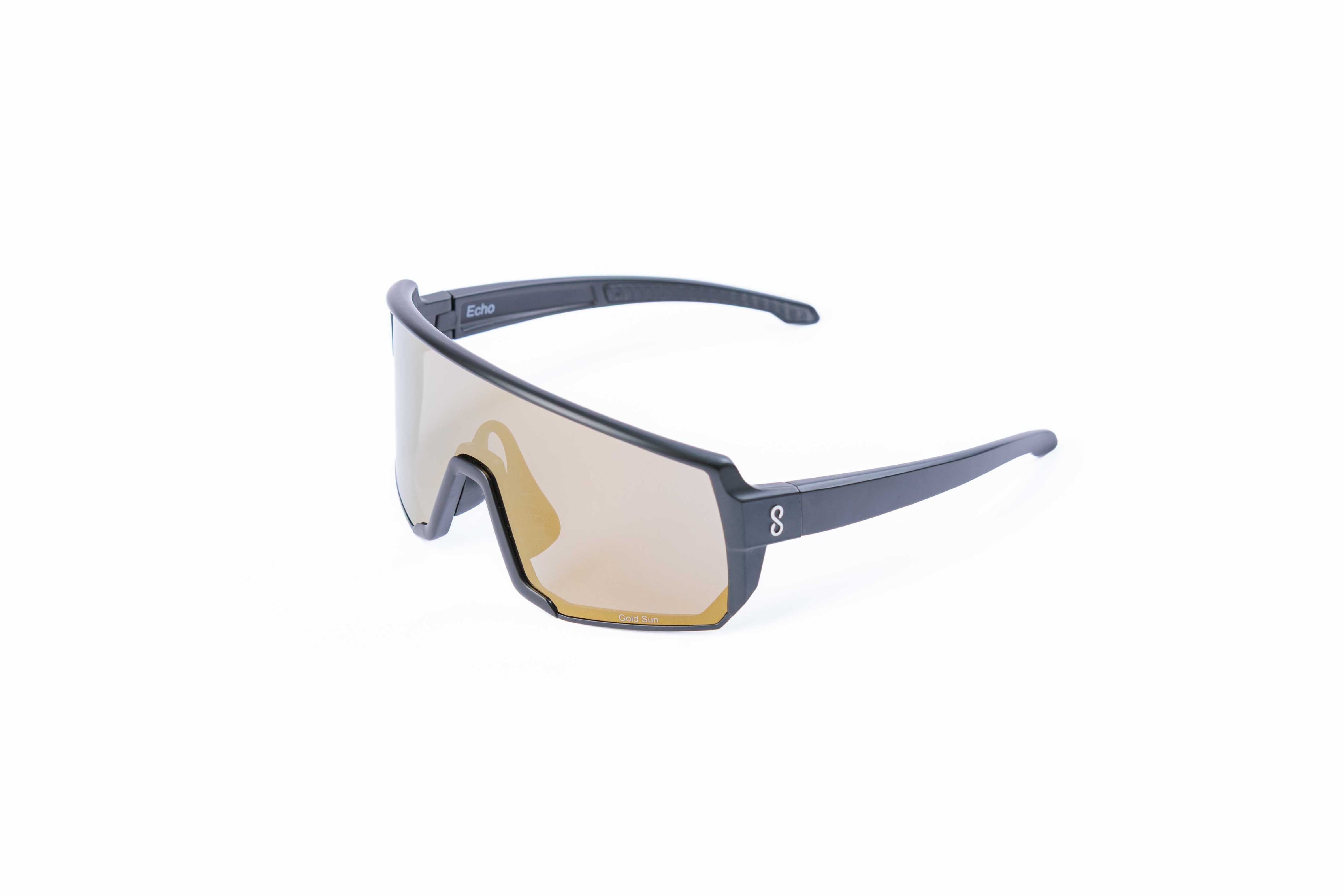 Small size black sunglasses with an interchangeable gold lens on a white background