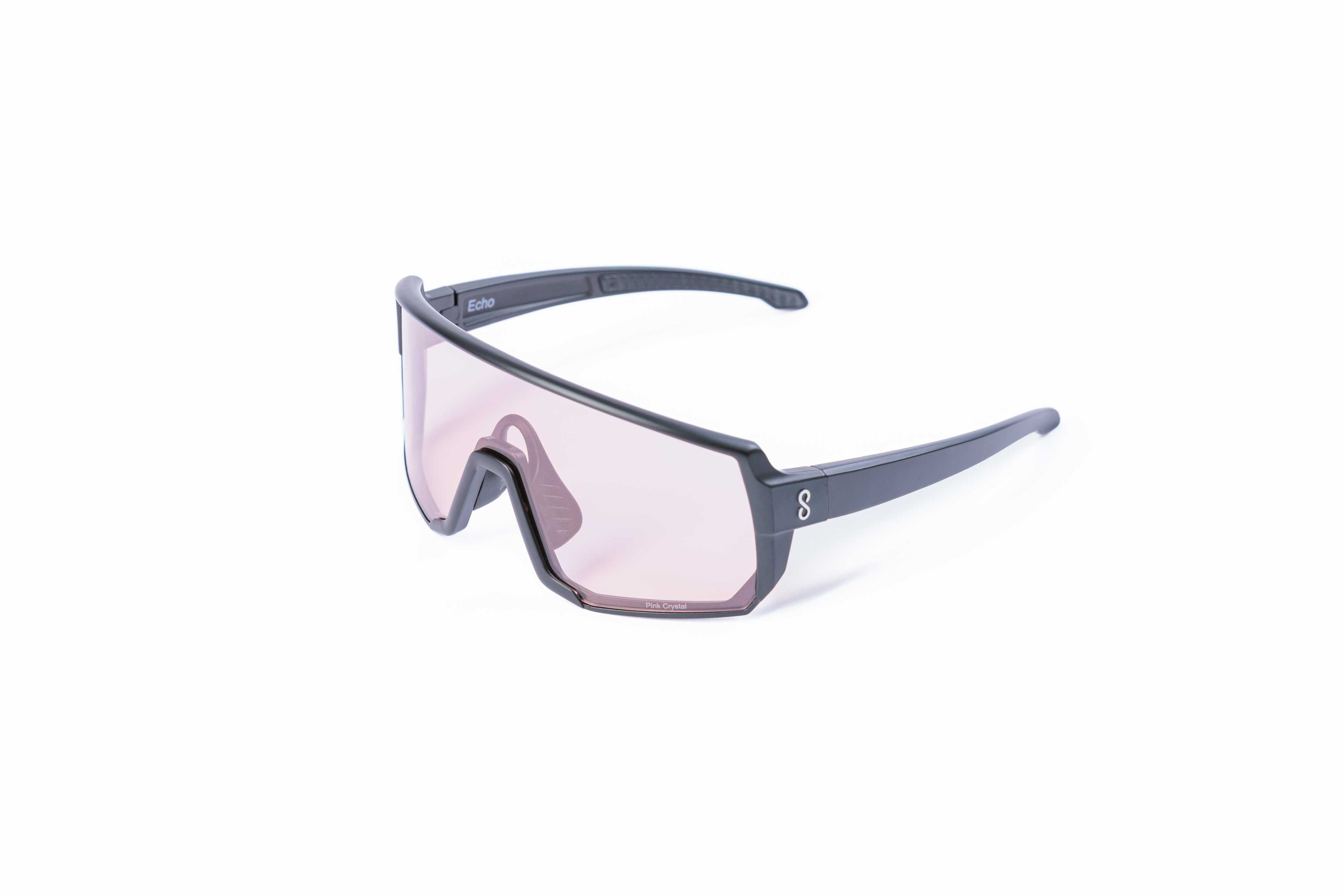 Small size black sunglasses with an interchangeable pink lens on a white background