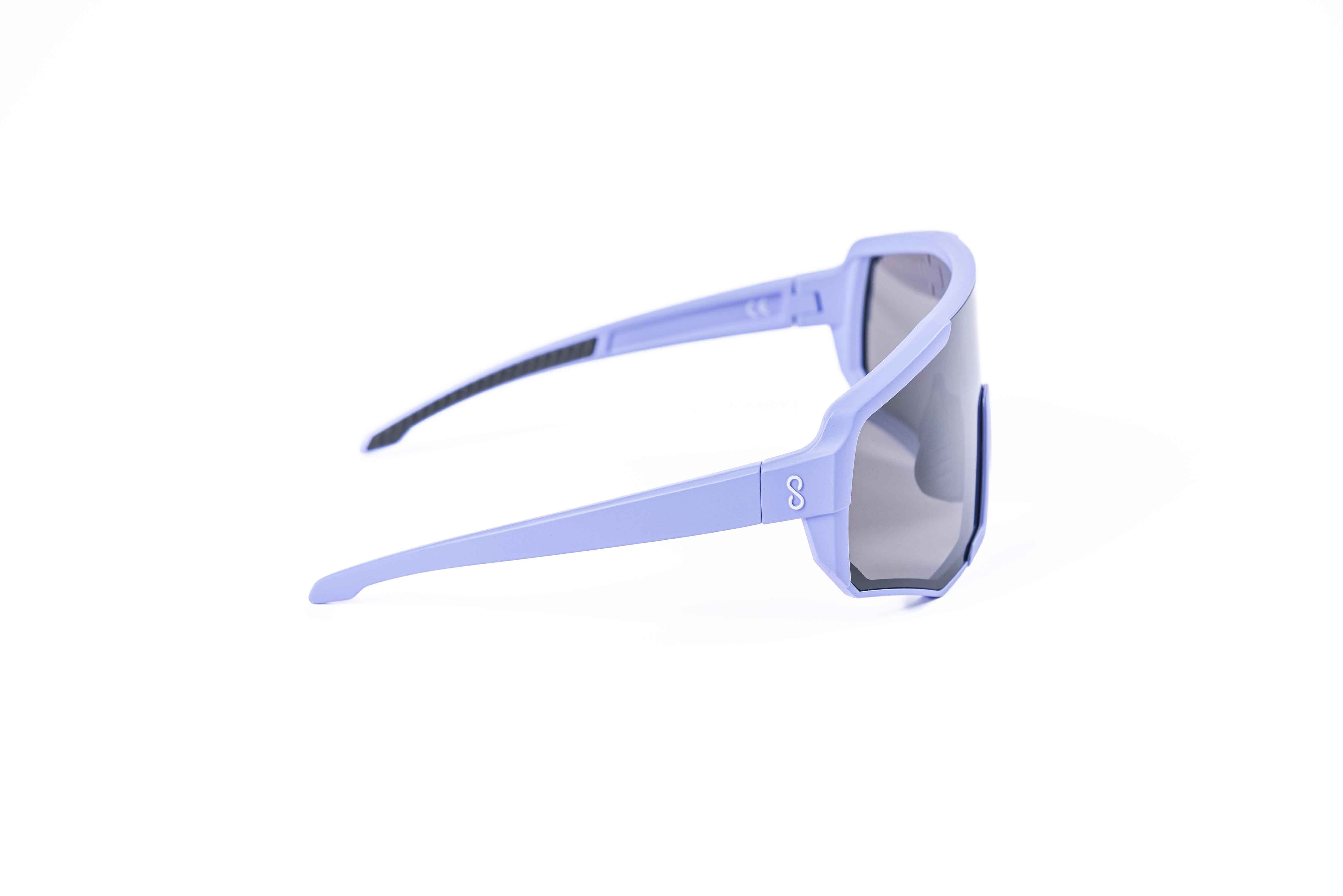 Coast Optics Nita 2 MTB riding glasses in purple frame with interchangeable lens, designed for trail and enduro riders.