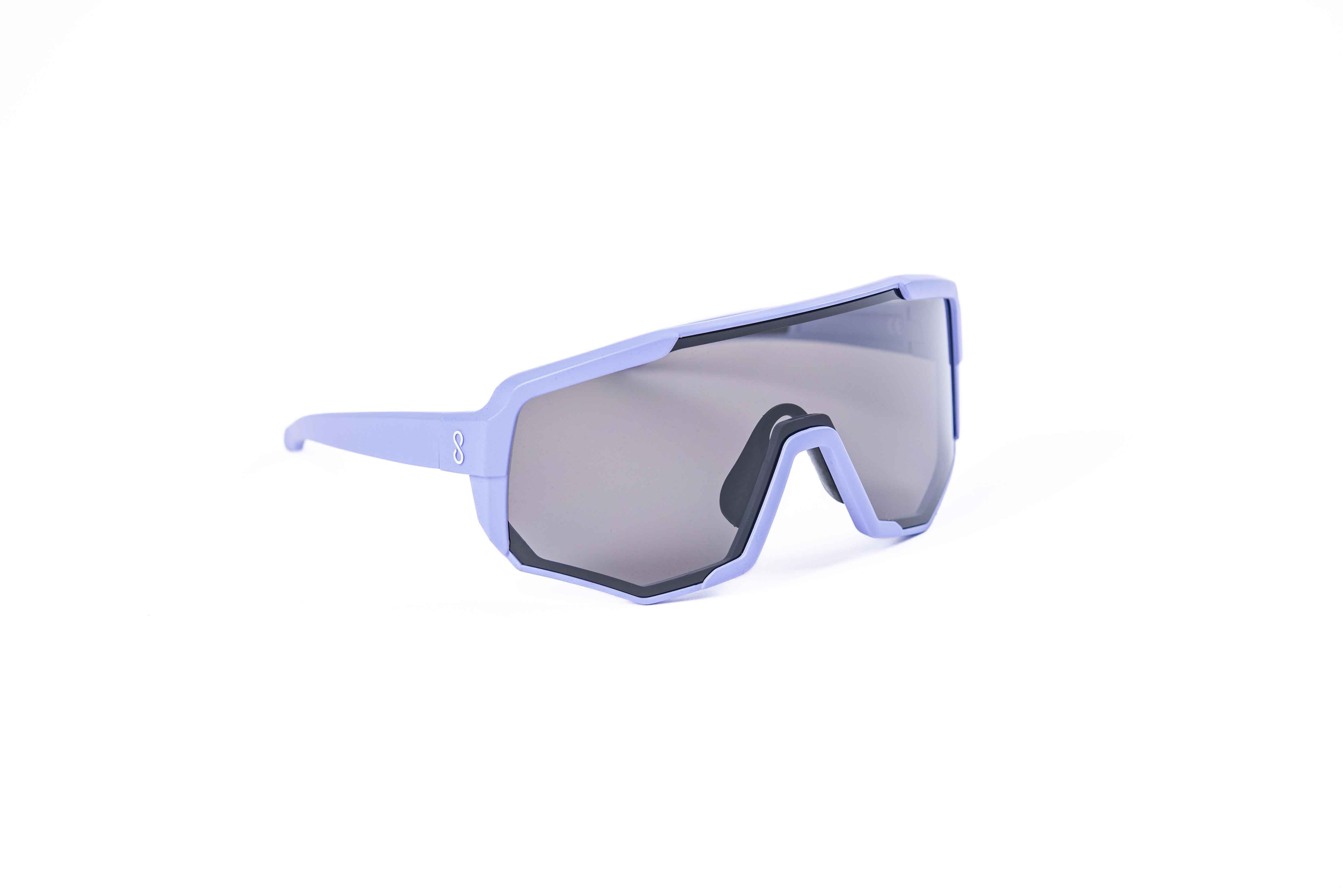 Coast Optics Nita 2 MTB riding glasses in purple frame with interchangeable lens, designed for trail and enduro riders.