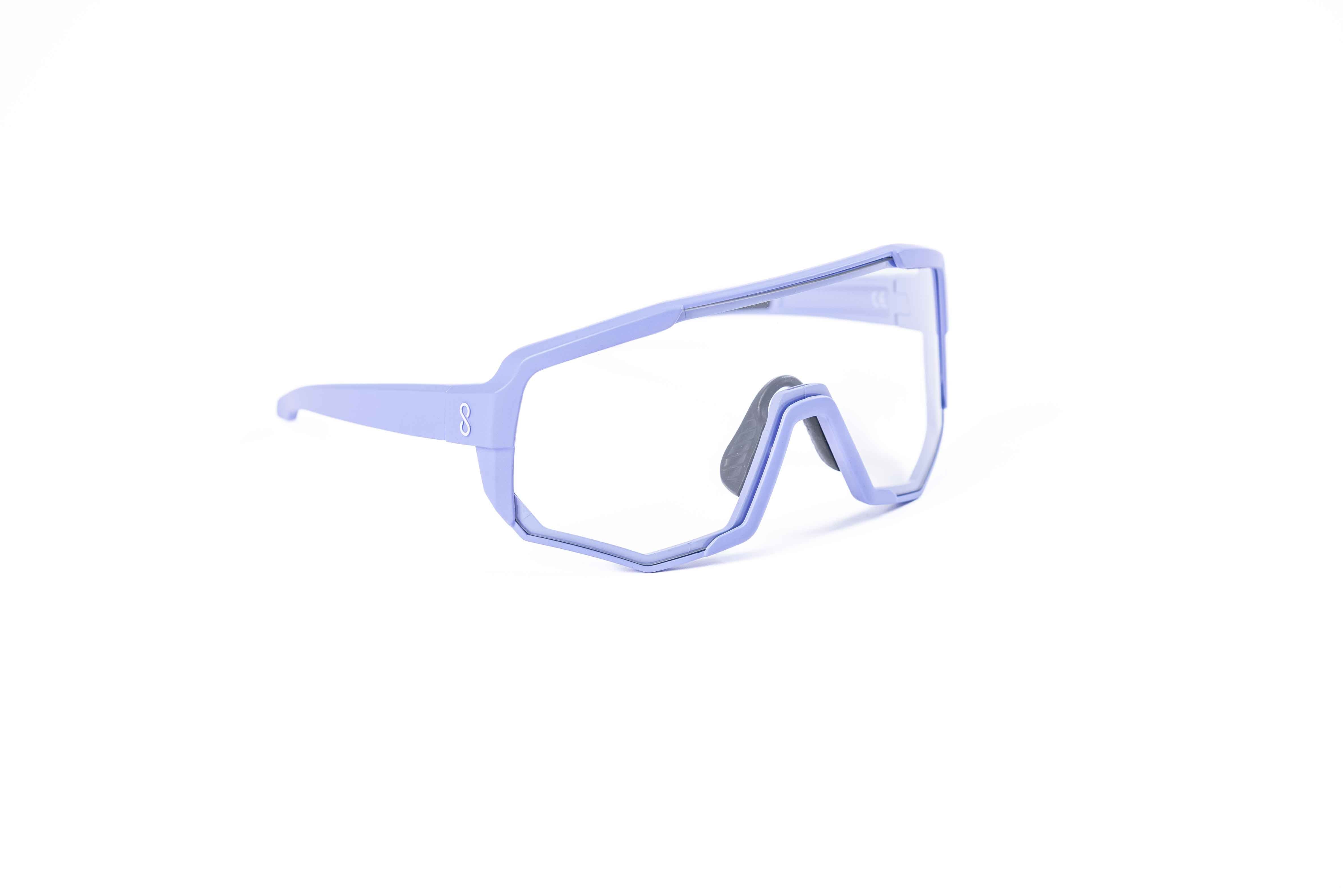 Coast Optics Nita 2 MTB riding glasses in purple frame with interchangeable lens, designed for trail and enduro riders.