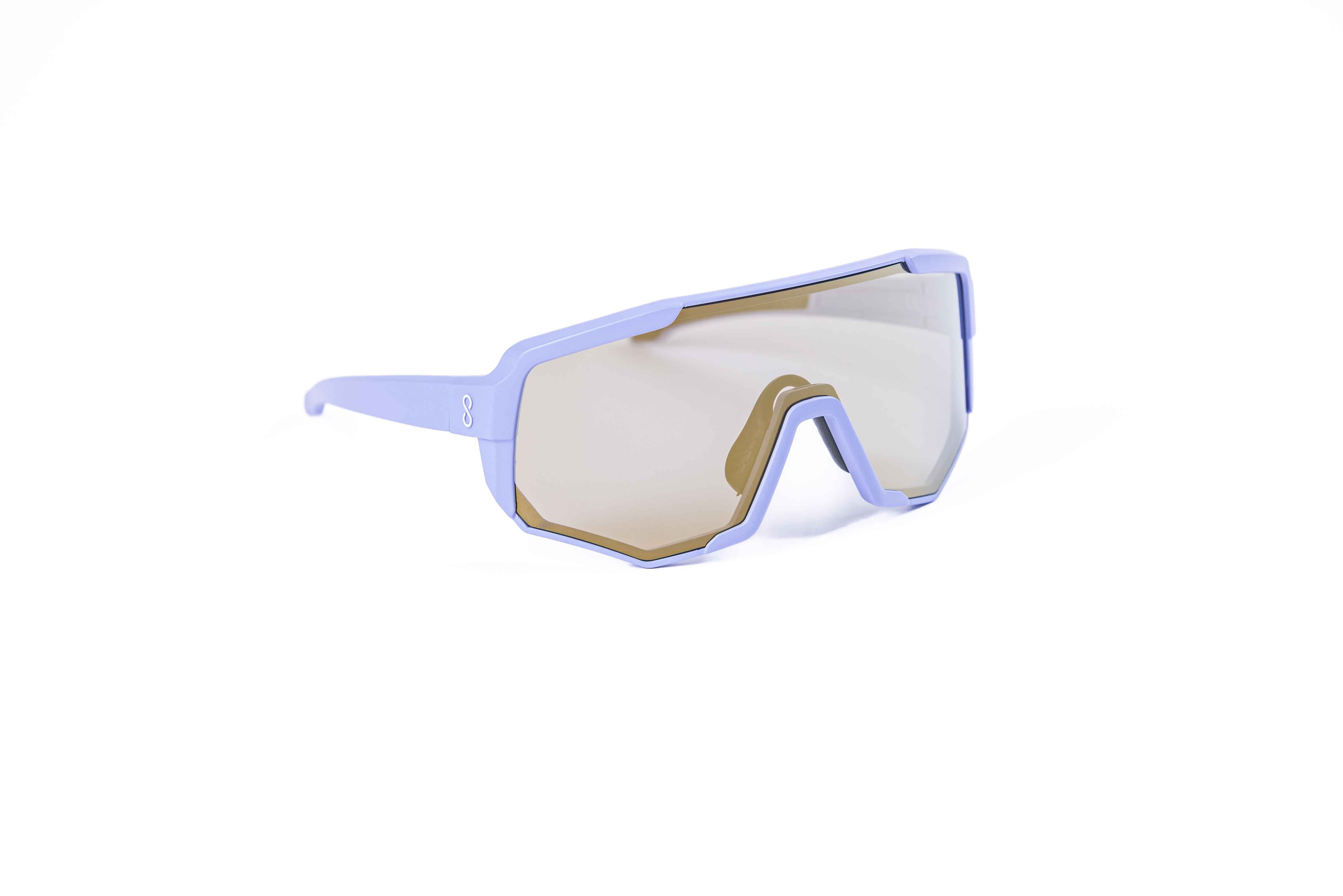 Coast Optics Nita 2 MTB riding glasses in purple frame with interchangeable lens, designed for trail and enduro riders.