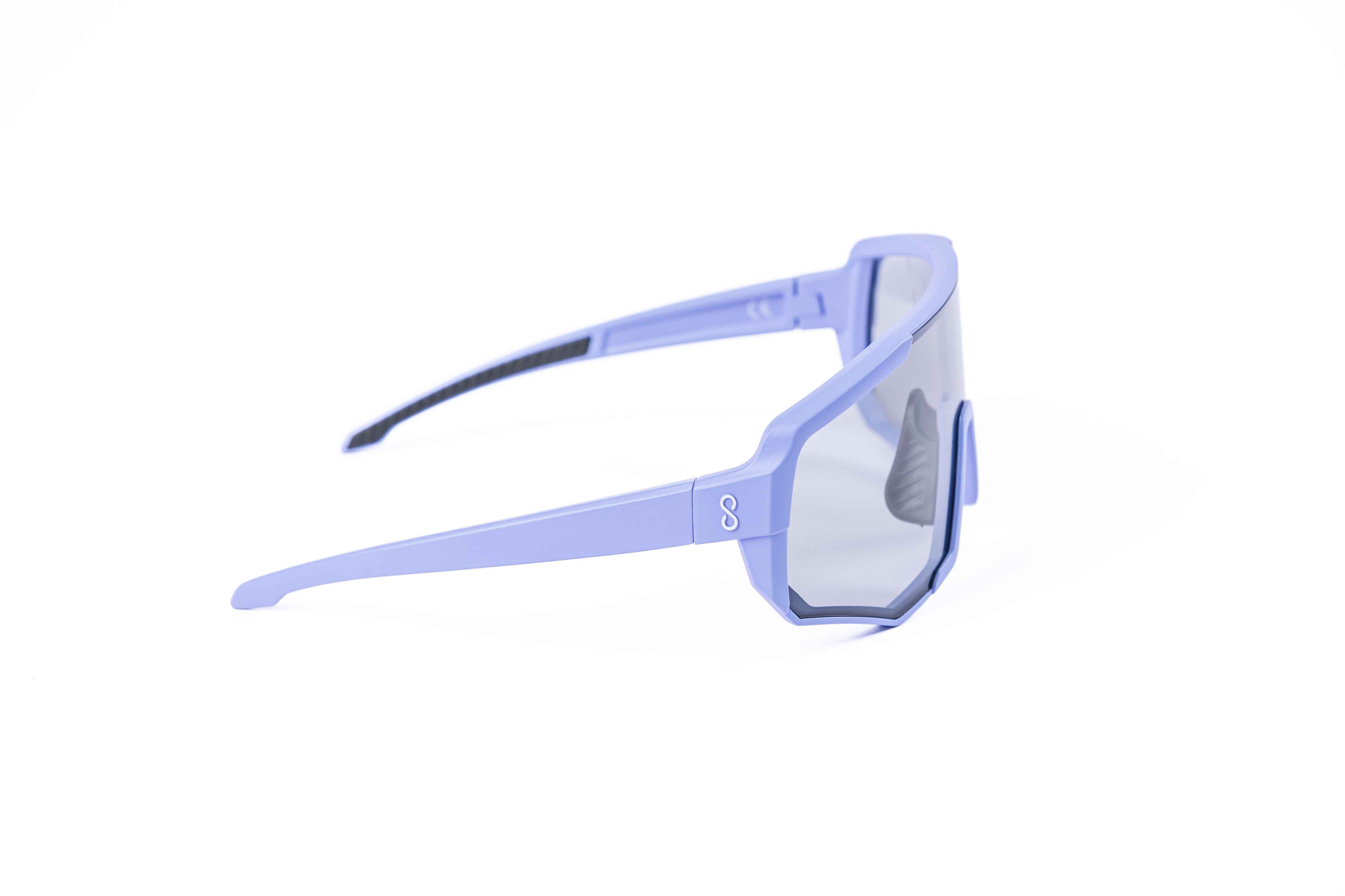 Coast Optics Nita 2 MTB riding glasses in purple frame with interchangeable lens, designed for trail and enduro riders.