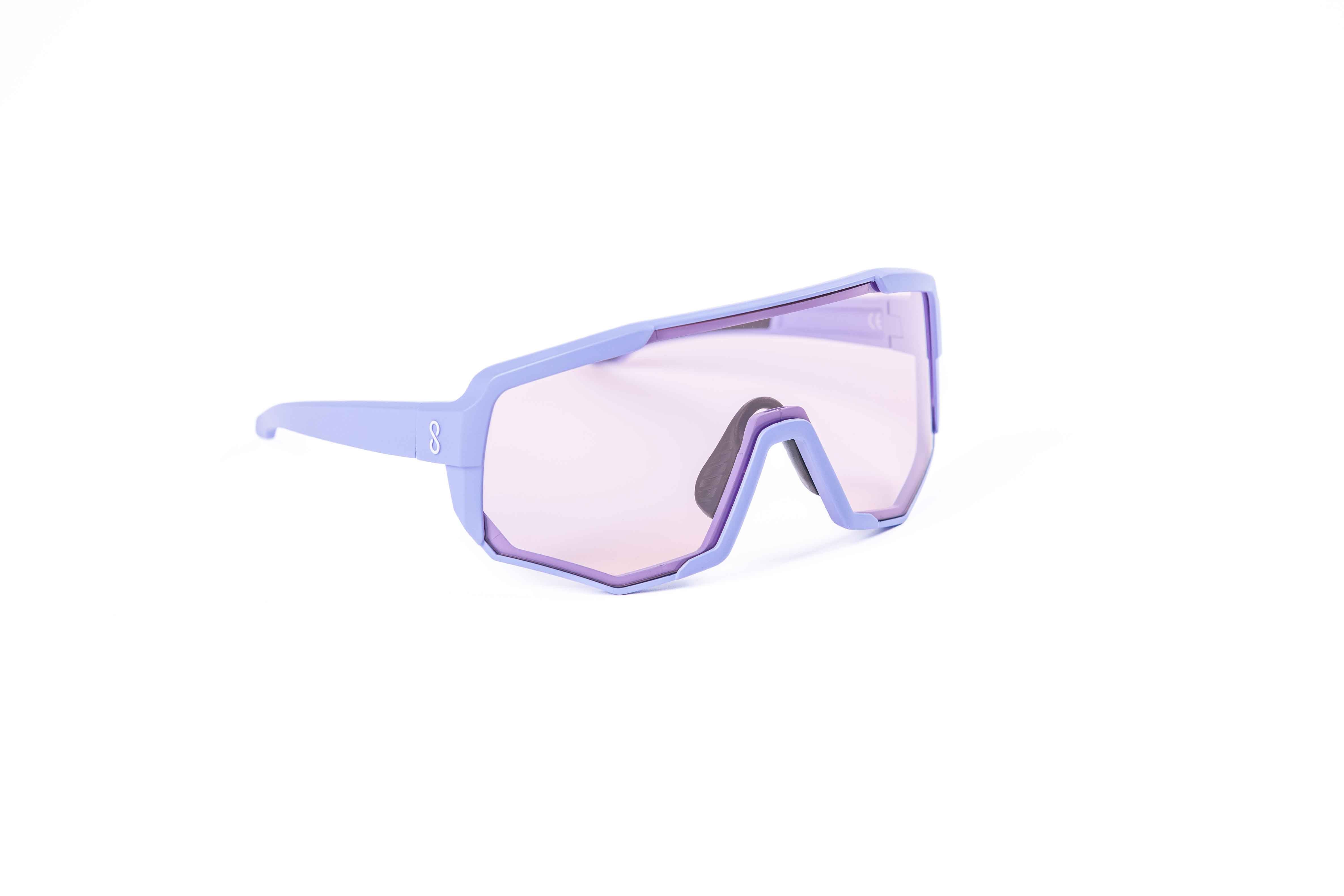 Coast Optics Nita 2 MTB riding glasses in purple frame with interchangeable lens, designed for trail and enduro riders.