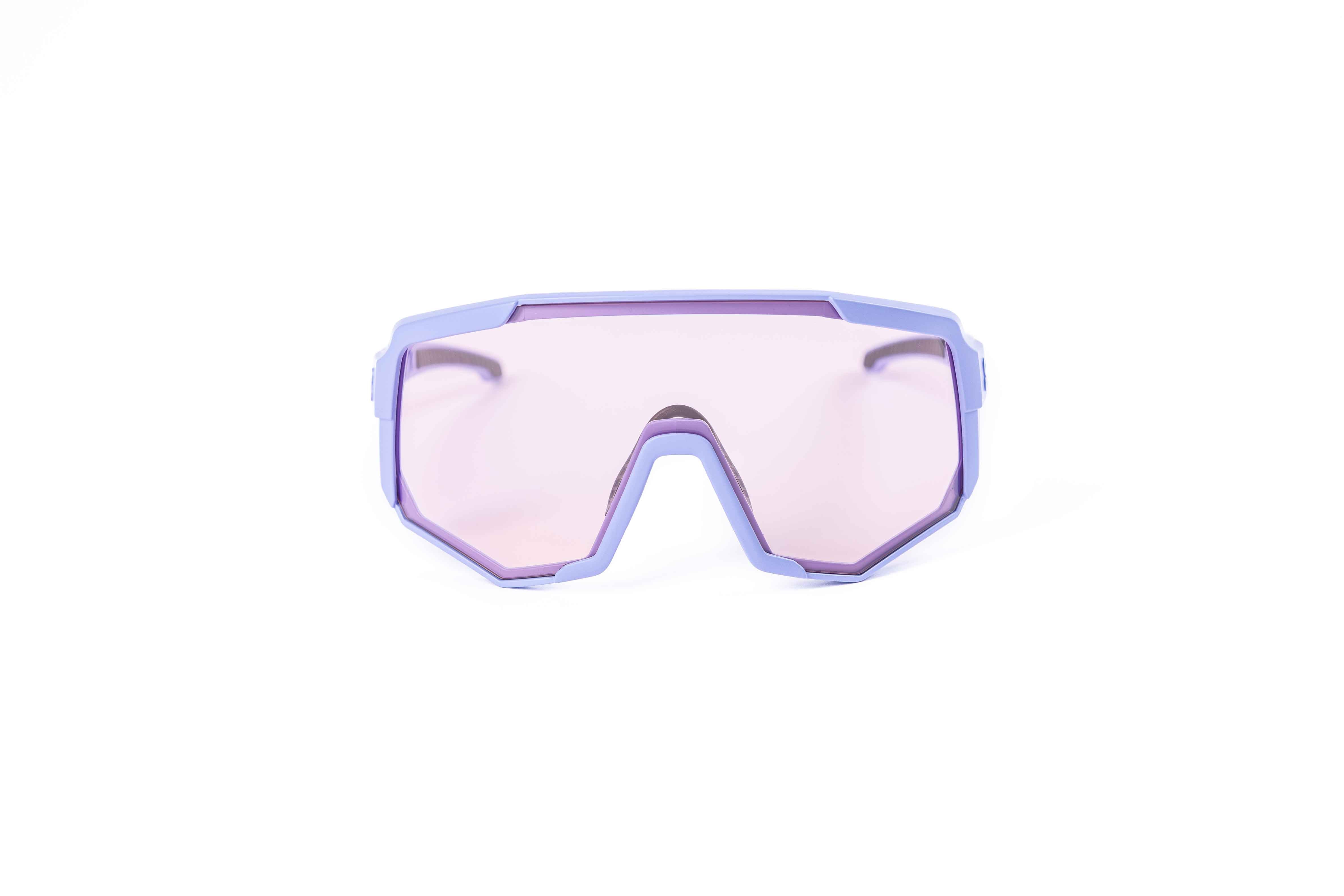 Coast Optics Nita XL MTB riding glasses in purple frame with interchangeable pink crystal lens, designed for trail and enduro riders.