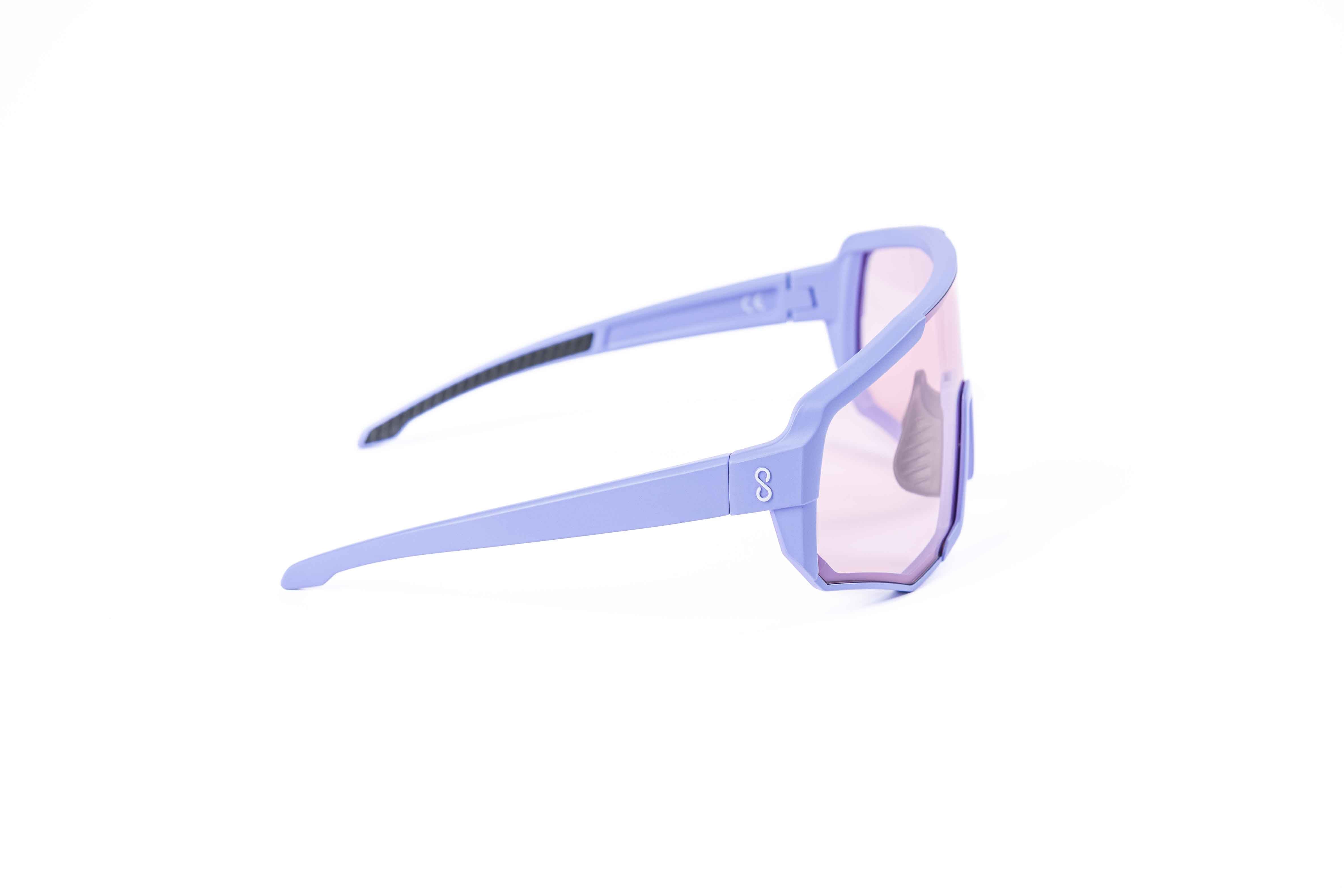 Coast Optics Nita 2 MTB riding glasses in purple frame with interchangeable lens, designed for trail and enduro riders.