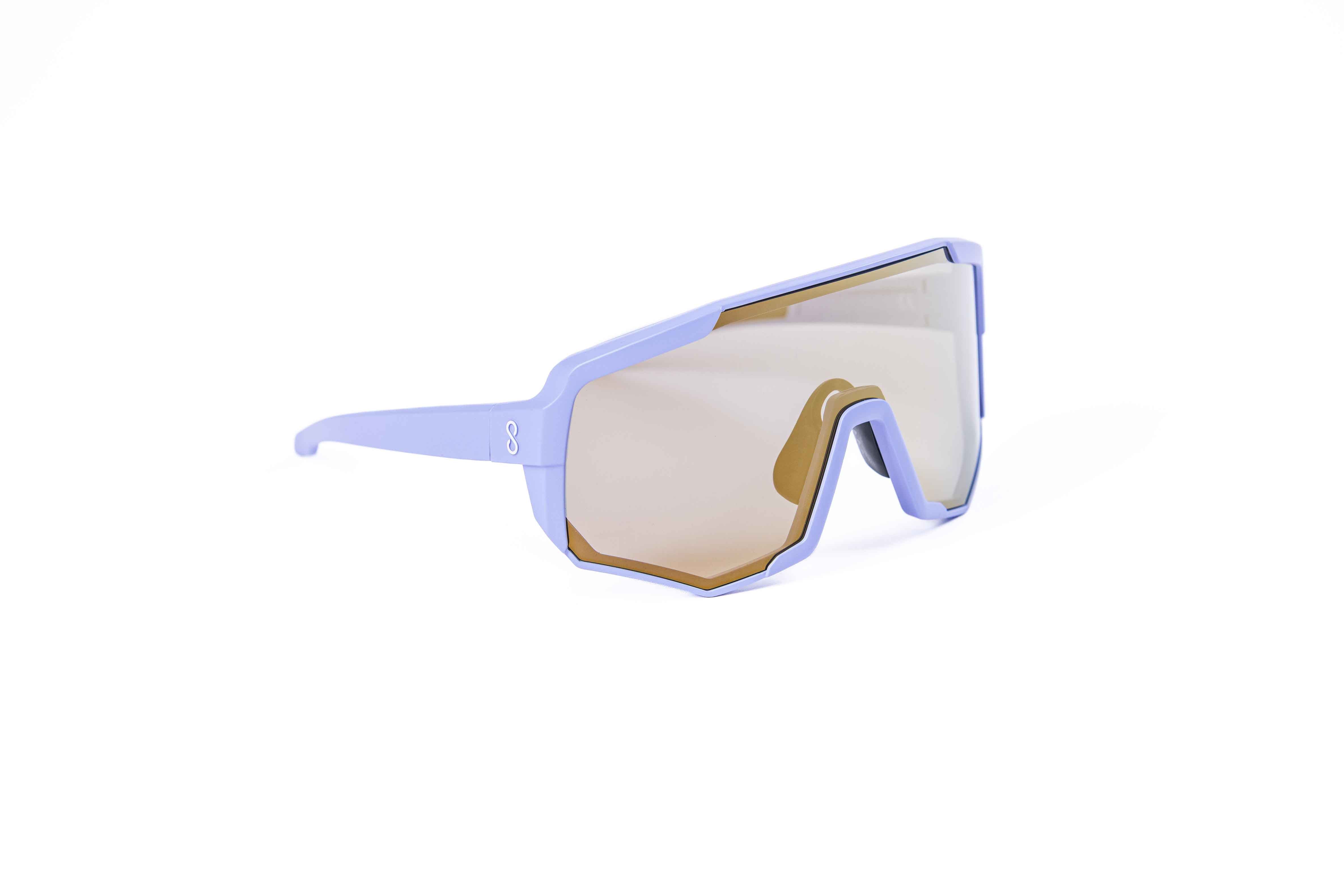 Coast Optics Nita XL MTB riding glasses in purple frame with interchangeable gold sun lens, designed for trail and enduro riders.