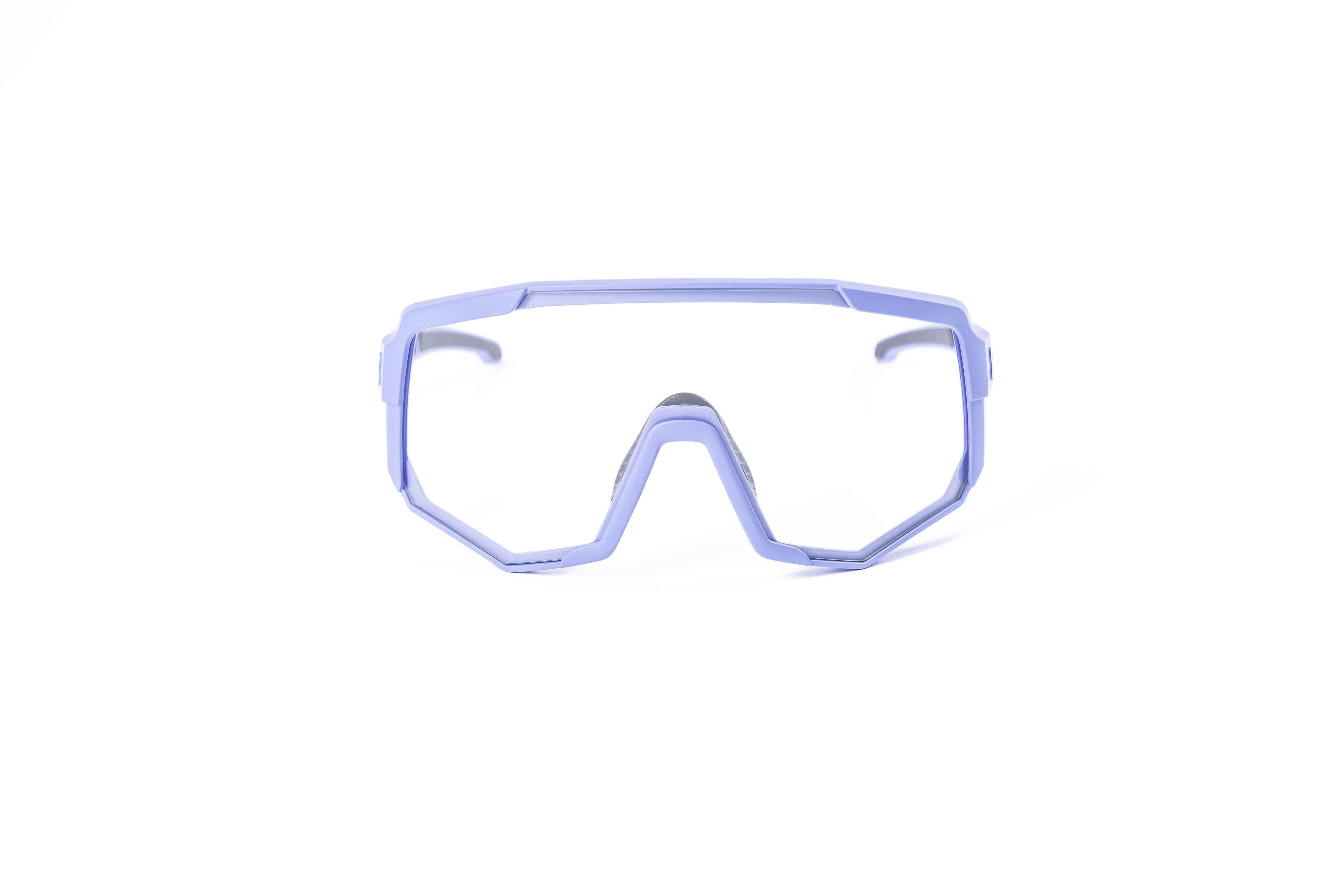 Coast Optics Nita XL MTB riding glasses in purple frame with interchangeable clear lens, designed for trail and enduro riders.