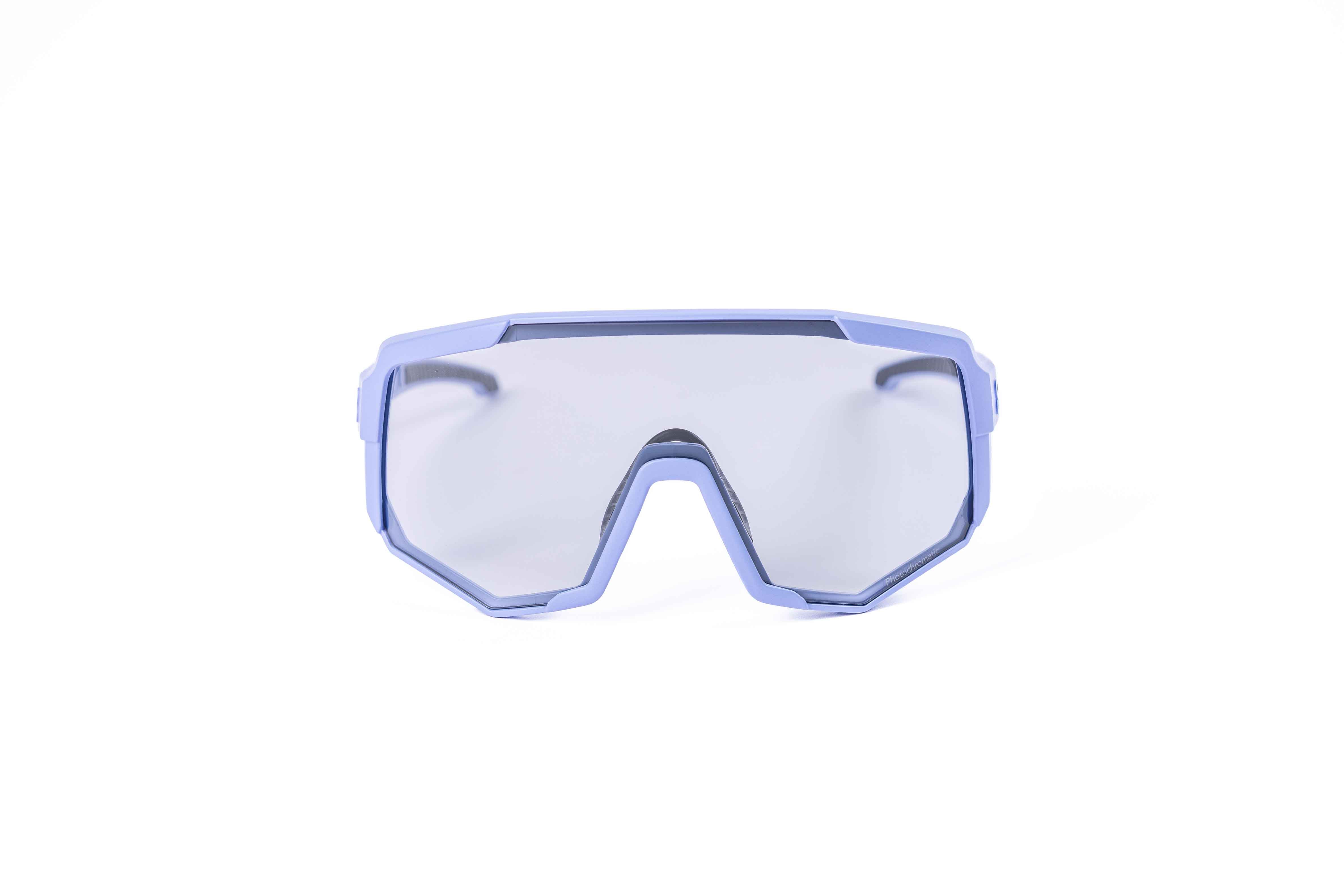 Coast Optics Nita XL MTB riding glasses in purple frame with interchangeable photochromatic lens, designed for trail and enduro riders.