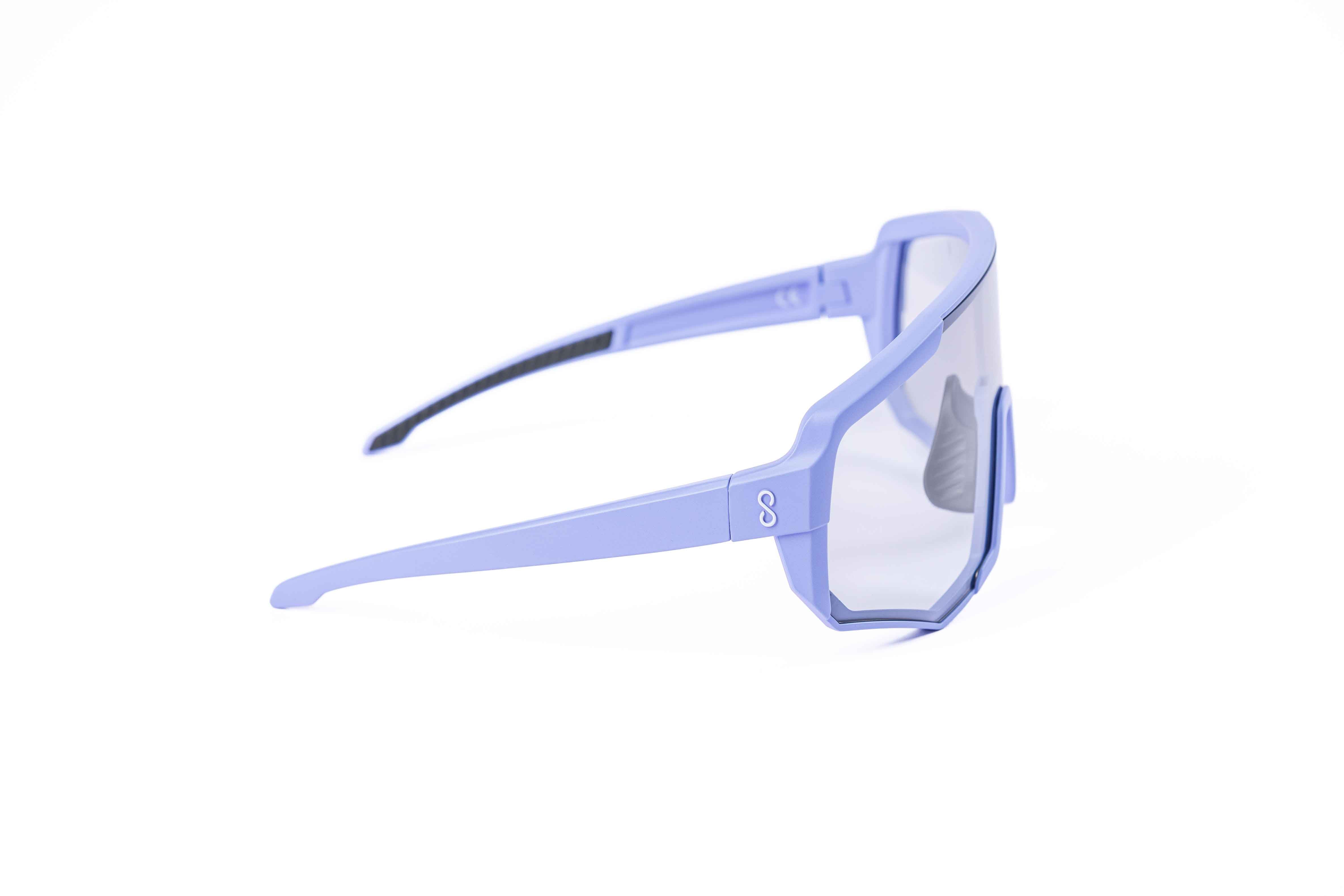 Coast Optics Nita XL MTB riding glasses in purple frame with interchangeable photochromatic lens, designed for trail and enduro riders.