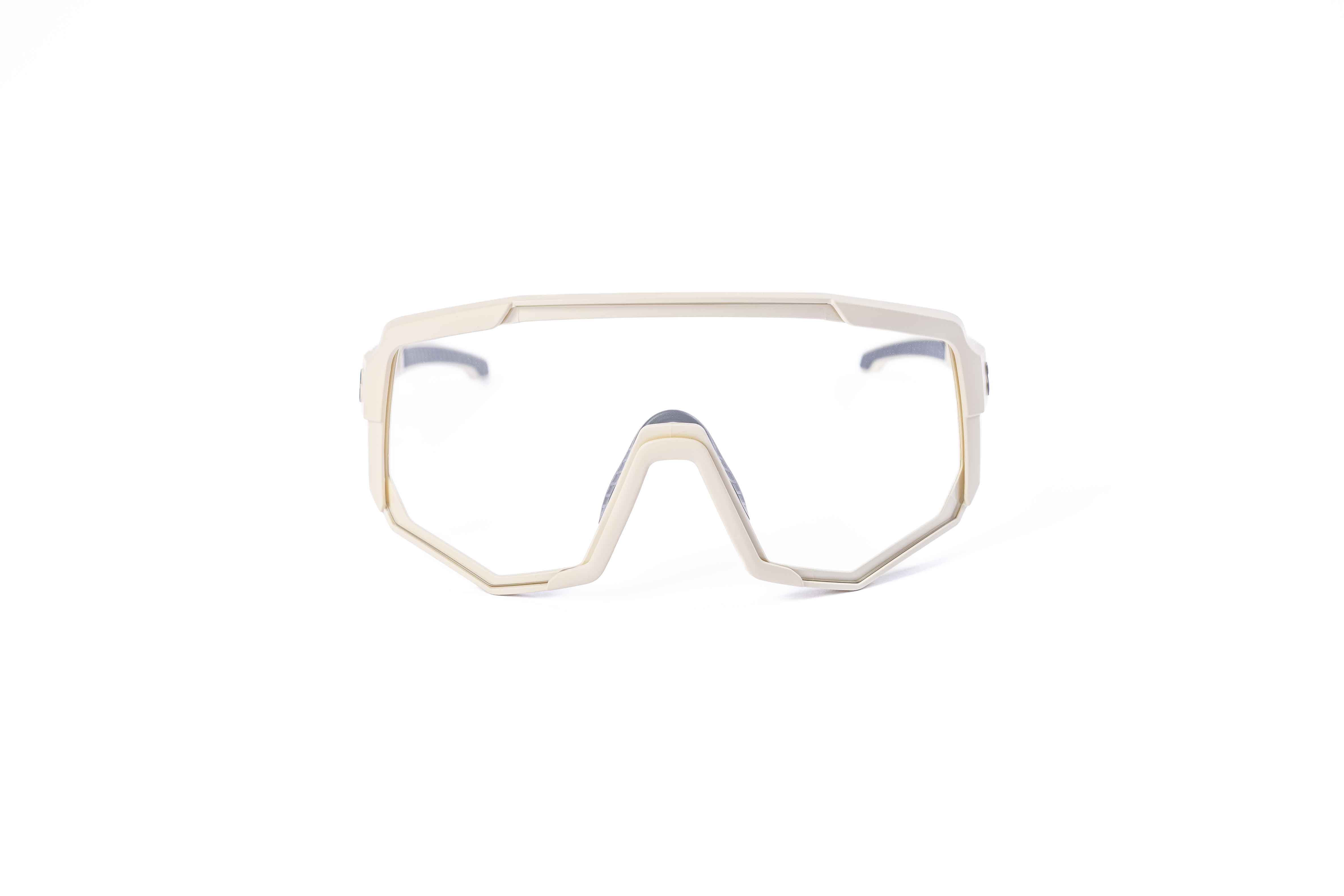 Coast Optics Nita XL MTB riding glasses in beige off-white frame with interchangeable lens, designed for trail and enduro riders.