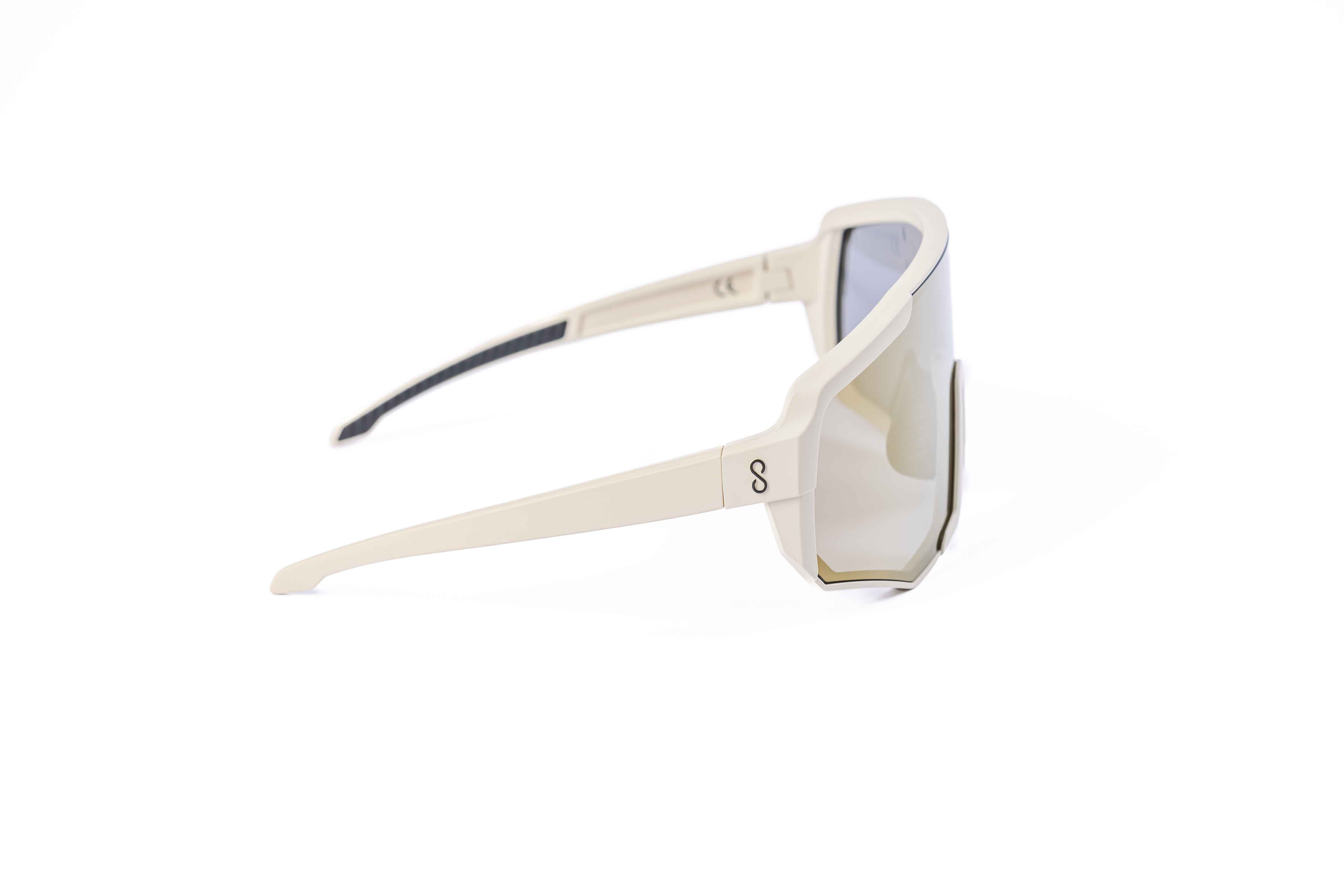 Coast Optics Nita XL MTB riding glasses in beige off-white frame with interchangeable lens, designed for trail and enduro riders.