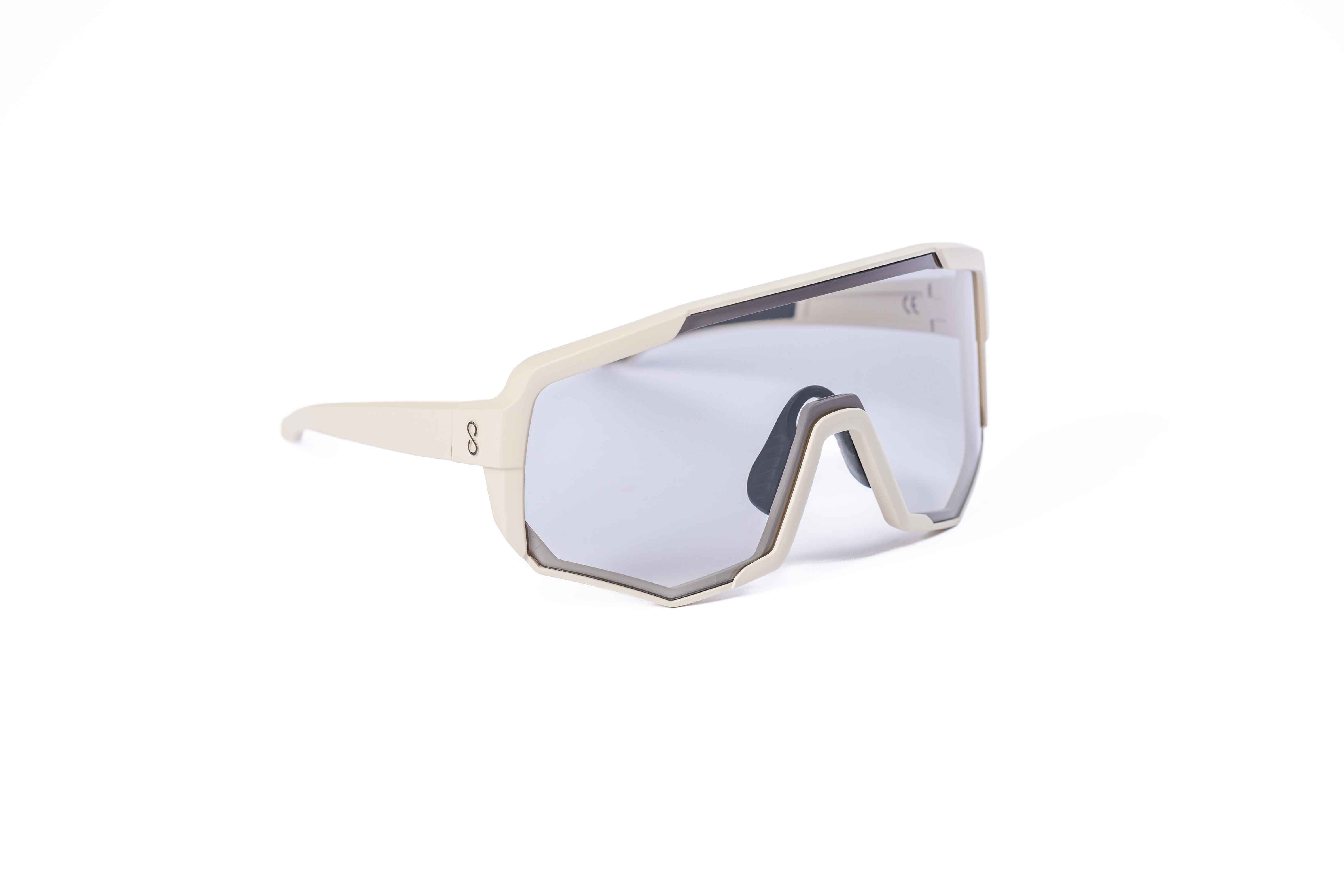 Coast Optics Nita XL MTB riding glasses in beige off-white frame with interchangeable lens, designed for trail and enduro riders.