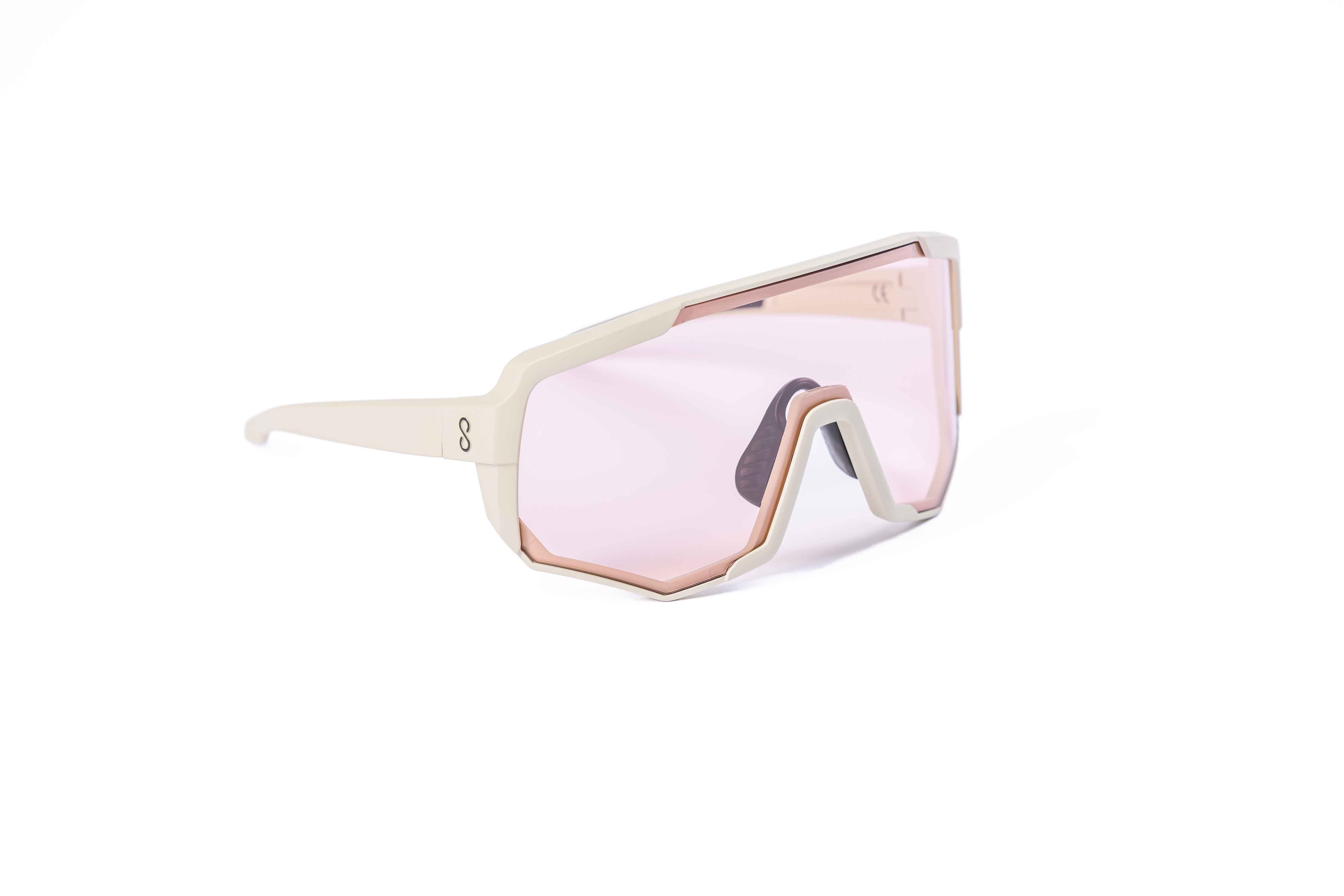 Coast Optics Nita XL MTB riding glasses in beige off-white frame with interchangeable lens, designed for trail and enduro riders.
